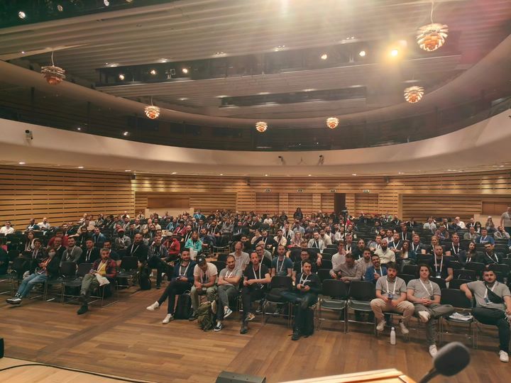 Dan Conn's view when speaking to a nearly full auditorium at Devoxx Greece 2023